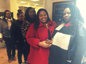 Members pose for a picture after visiting Senator Kama Harris' office