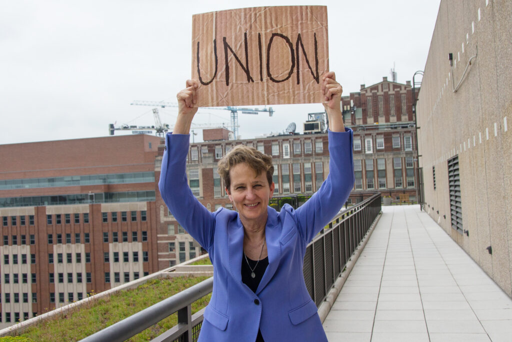 Mary-Kay-Henry-Raises-Union-Sign.jpg