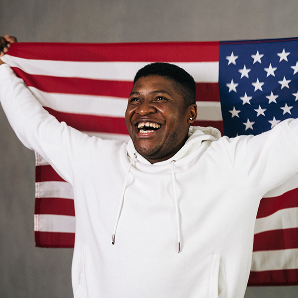 somone celebrating with an american flag