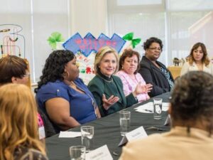 Hillary Clinton met with child care workers & consumers in the spring. Now she's meeting with home care providers & those who rely on them.